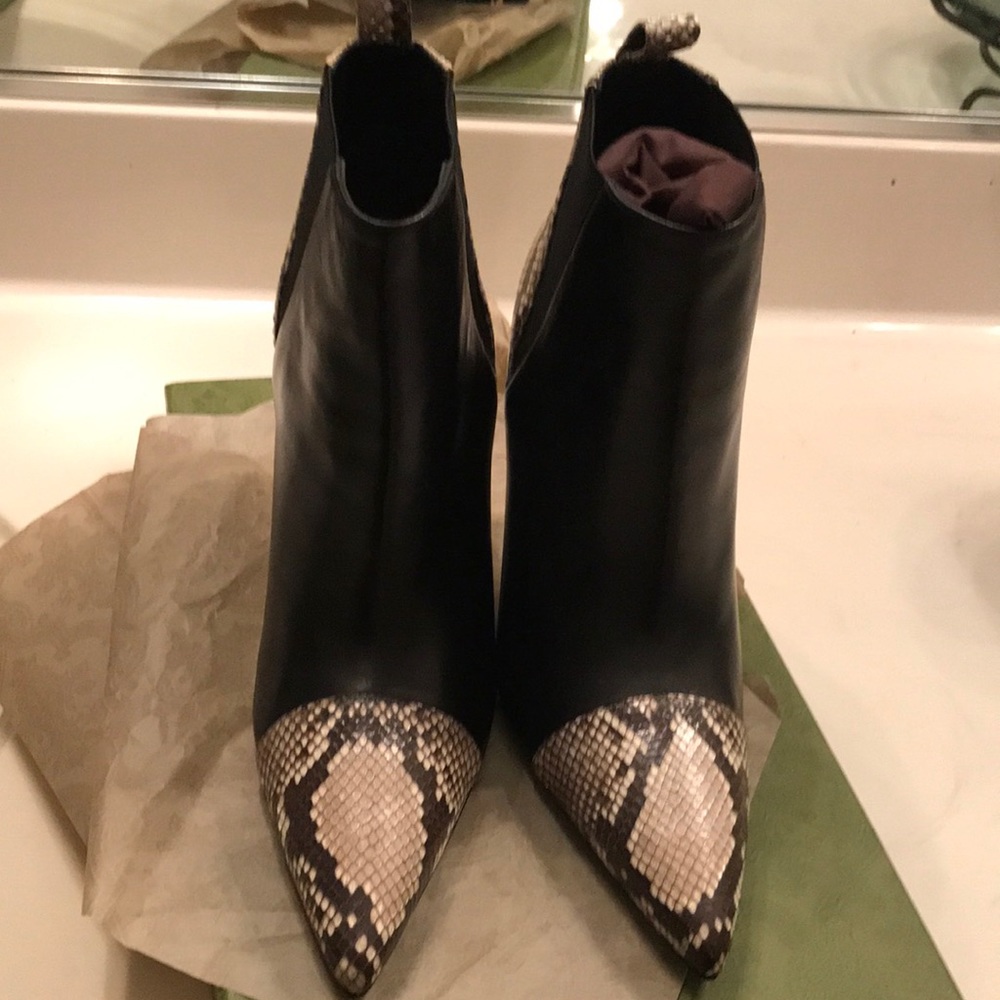 Authentic animal print designer booties.
